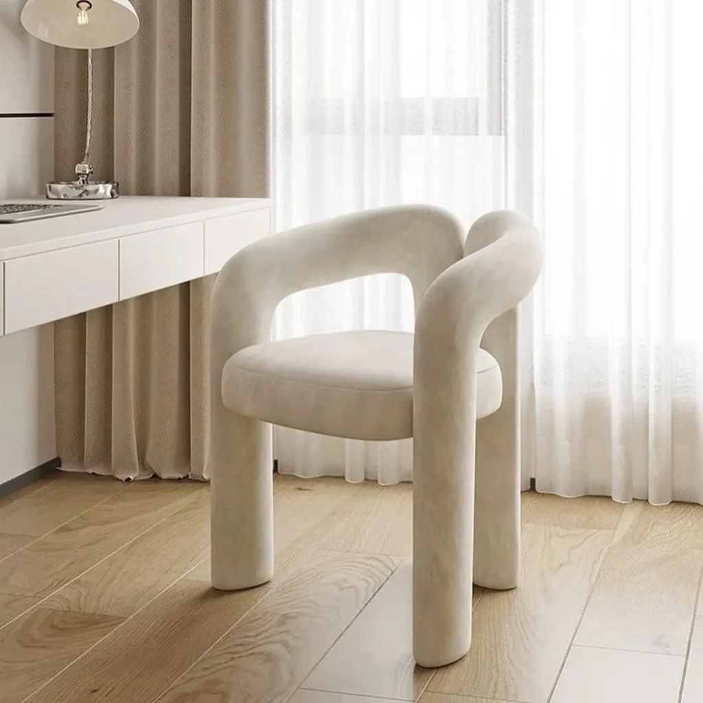 Sohnne Dudet Armchair Replica in a retro-inspired design with soft, rounded edges, upholstered for maximum comfort