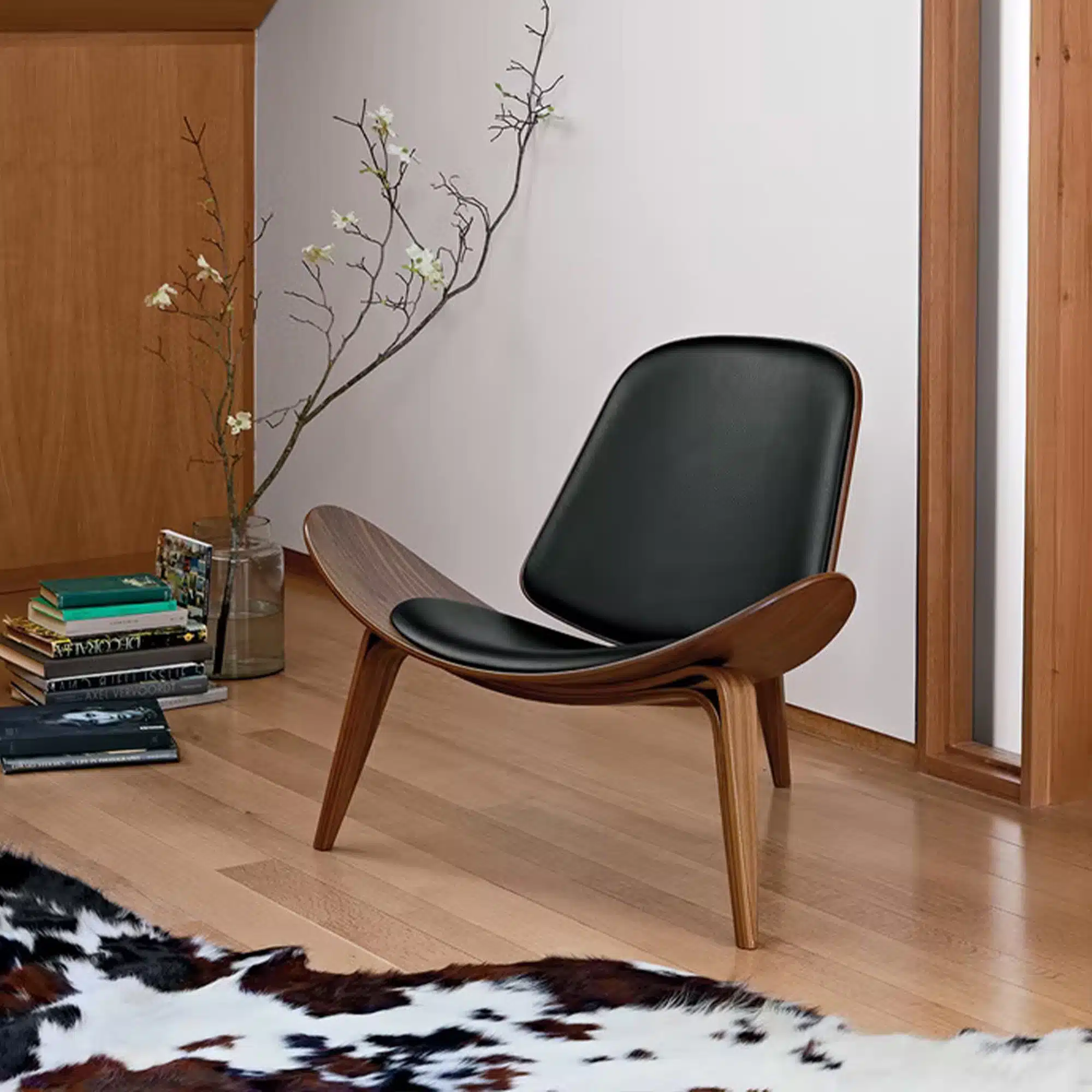 Sohnne CH07 Shell Chair Replica featuring a sleek wooden frame with a curved seat and back, designed for modern comfort and style