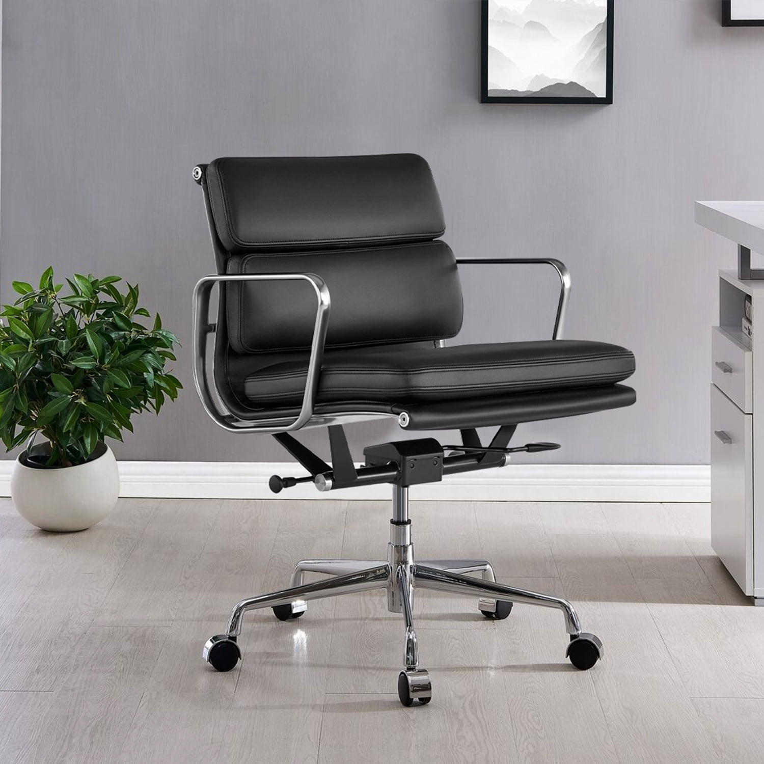Sohnne Eames Soft Pad Group Management Chair Replica, a stylish and comfortable office chair with padded cushions and aluminum frame for modern office spaces